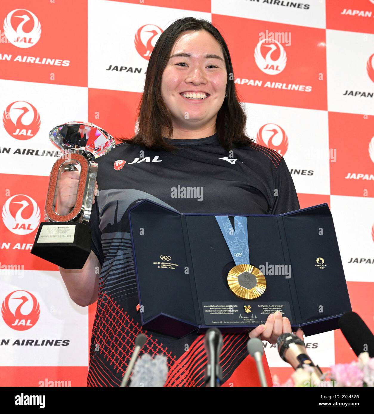 Japanese athlete Haruka Kitaguchi poses for a photo with the Paris ...