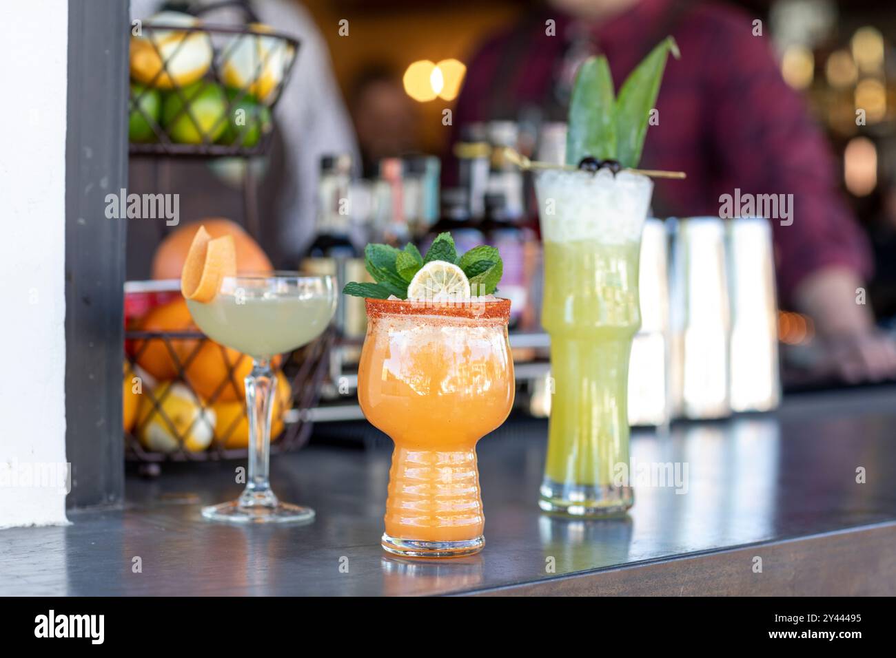 Cocktails sitting on bar ready to serve Stock Photo - Alamy