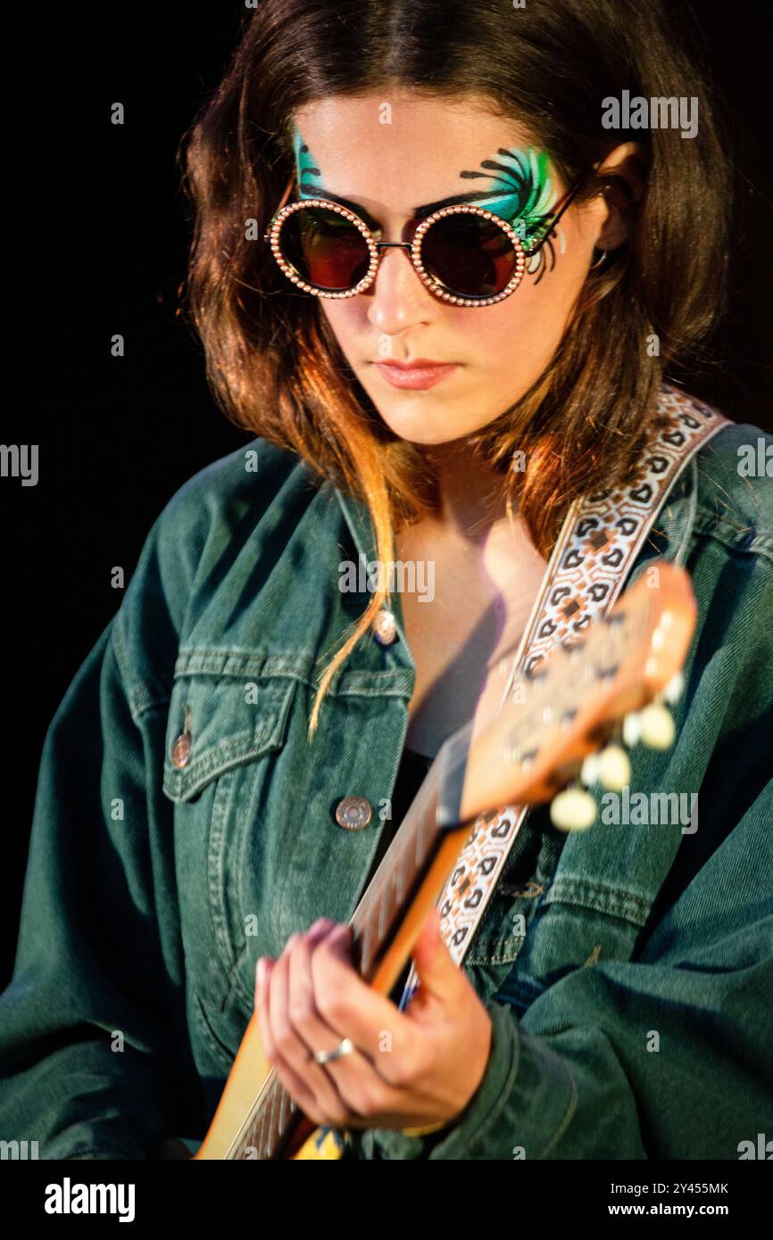 FARAO, CONCERT, GREEN MAN FESTIVAL 2014:  Norwegian singer songwriter Farao – real name Kari Jahnsen – playing a Danelectro Guitar live on the XXXX Stage at the Green Man Festival 2014 at Glanusk Park, Brecon, Wales, August 2014. Photo: Rob Watkins. INFO: Farao is the musical project of Norwegian singer-songwriter Kari Jahnsen, known for her ethereal voice and genre-blending sound that combines folk, electronic, and experimental pop. Her music features intricate production, dreamy synths, and introspective lyrics, creating a haunting and atmospheric experience. Stock Photo