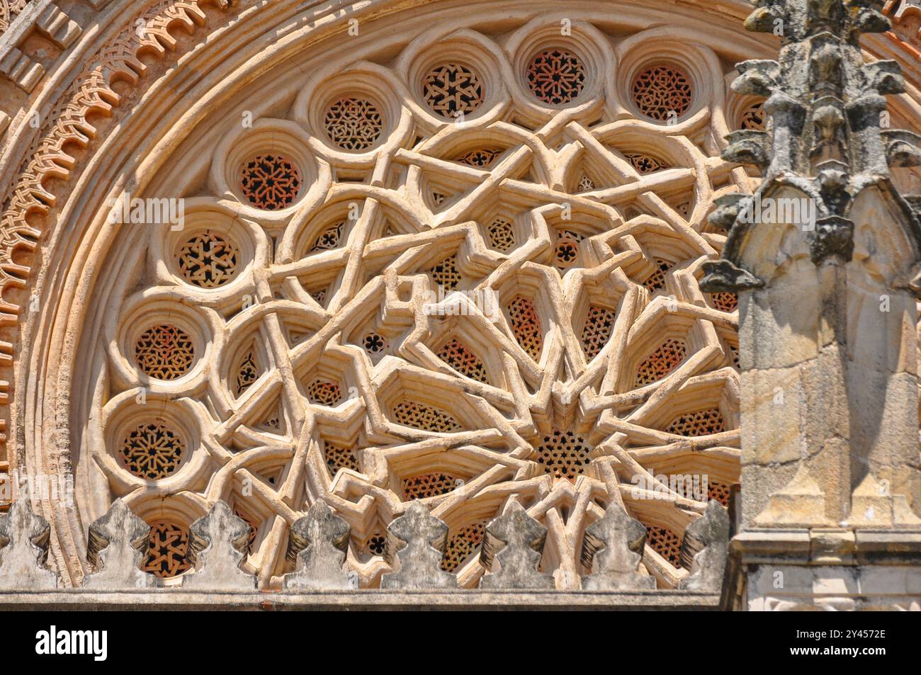 The Royal Monastery of Santa María de Guadalupe with your notable facade for its Mudéjar works Stock Photo