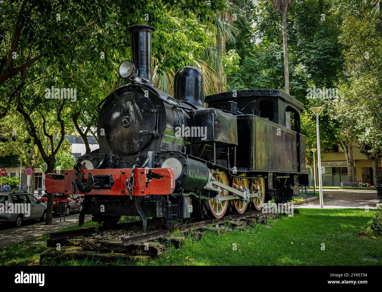 Old steam locomotive on coal from the Alcoy-Gandia line in front of Gandia station, Spanish narrow gauge railways. Stock Photo