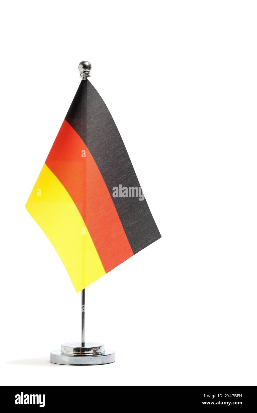 German flag on small flagpole, highlighted on white background Stock Photo