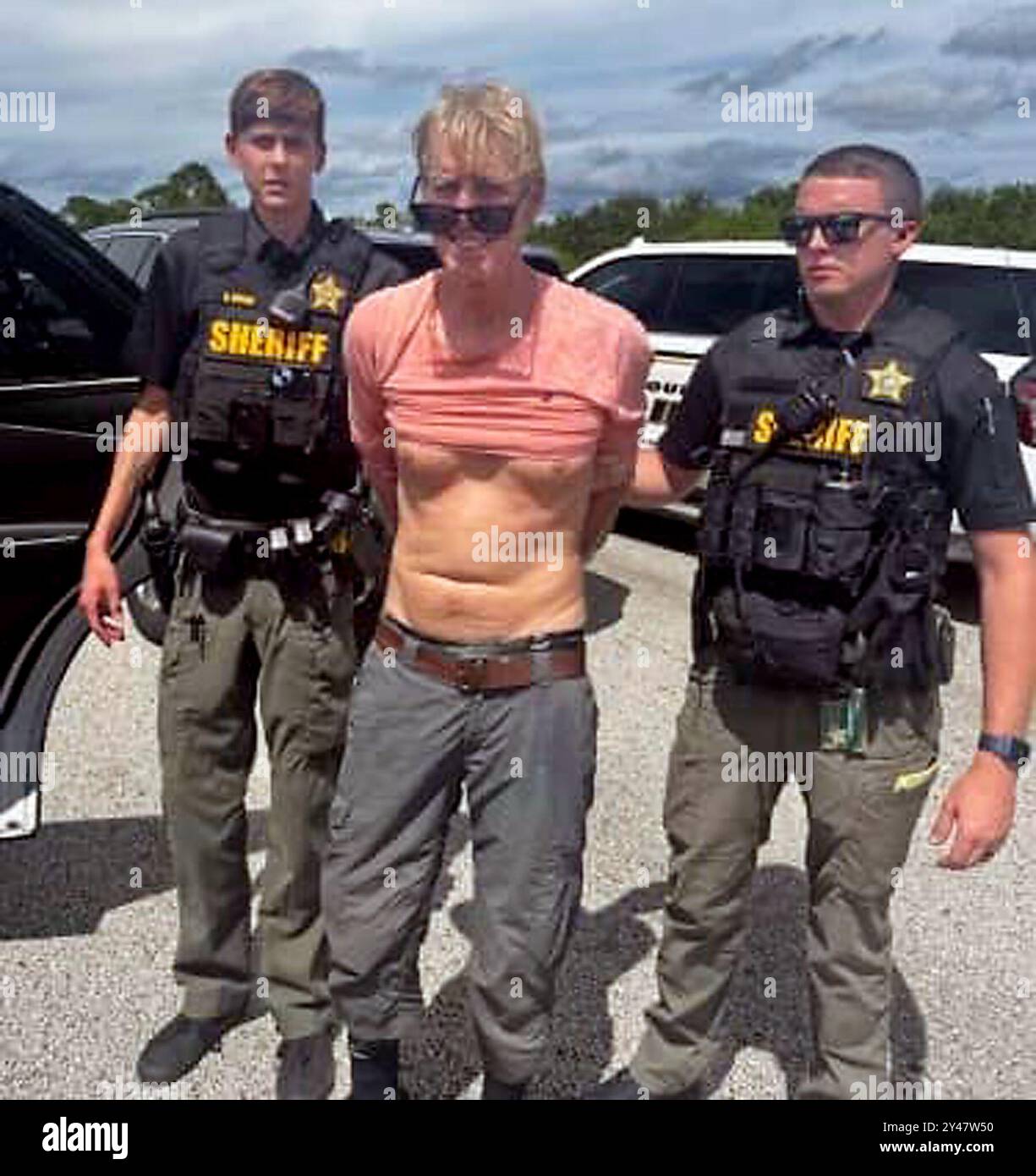 Martin County, Florida, USA. 16th Sep, 2024. RYAN WESLEY ROUTH, accused attempted assassin suspect of former President Trump, is apprehended by Martin County Sheriff's Office. The Martin County Sheriff's Office shared a photo Monday from a September 15, 2024 traffic stop of the moment deputies arrested suspect Routh on Sunday afternoon. (Credit Image: © Martin County Sheriff's Office/ZUMA Press Wire) EDITORIAL USAGE ONLY! Not for Commercial USAGE! Credit: ZUMA Press, Inc./Alamy Live News Stock Photo