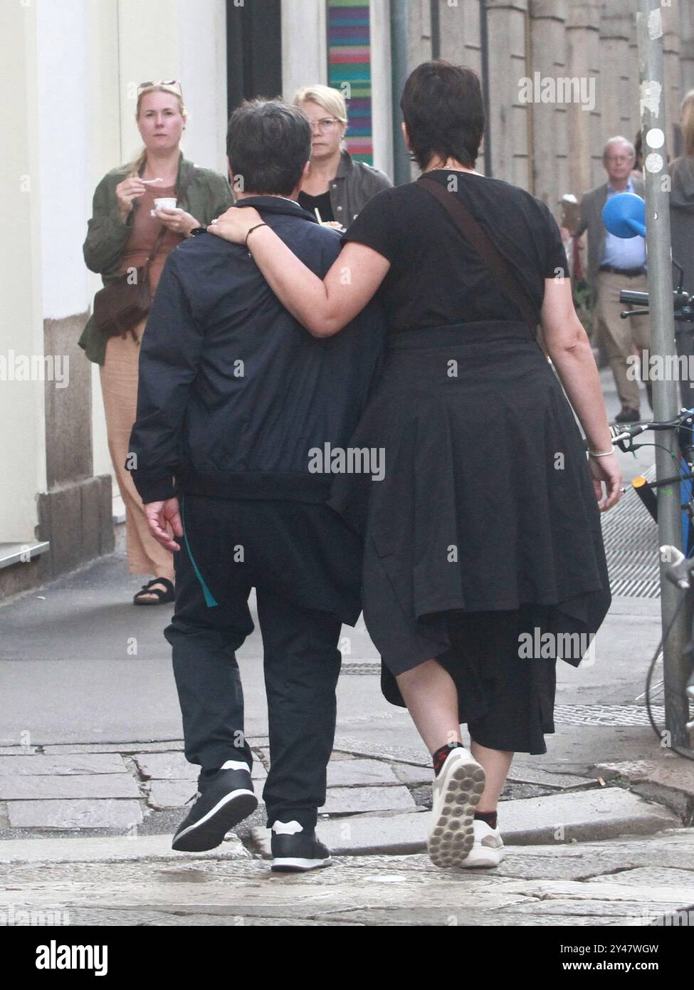 09/16/2024 Milan Ph. Paolo Della Bella The Wizard Forest with his wife Angela walking hand in hand in via Monte Napoleone in Milan. The couple stops with fans for the ritual photos. Stock Photo