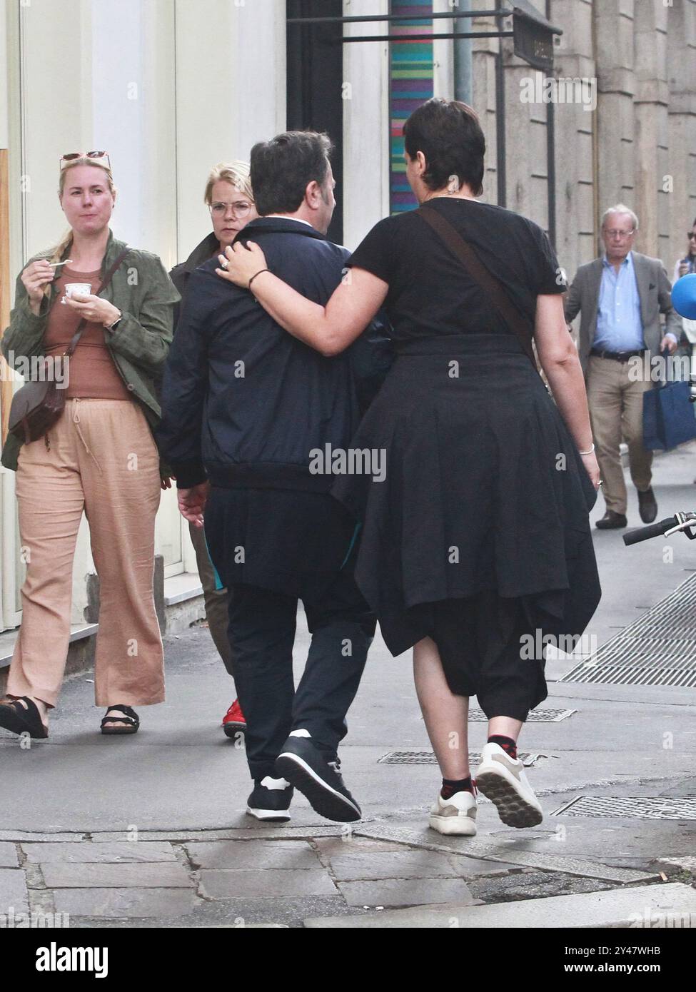 09/16/2024 Milan Ph. Paolo Della Bella The Wizard Forest with his wife Angela walking hand in hand in via Monte Napoleone in Milan. The couple stops with fans for the ritual photos. Stock Photo