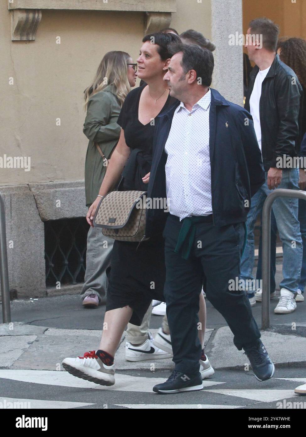 09/16/2024 Milan Ph. Paolo Della Bella The Wizard Forest with his wife Angela walking hand in hand in via Monte Napoleone in Milan. The couple stops with fans for the ritual photos. Stock Photo