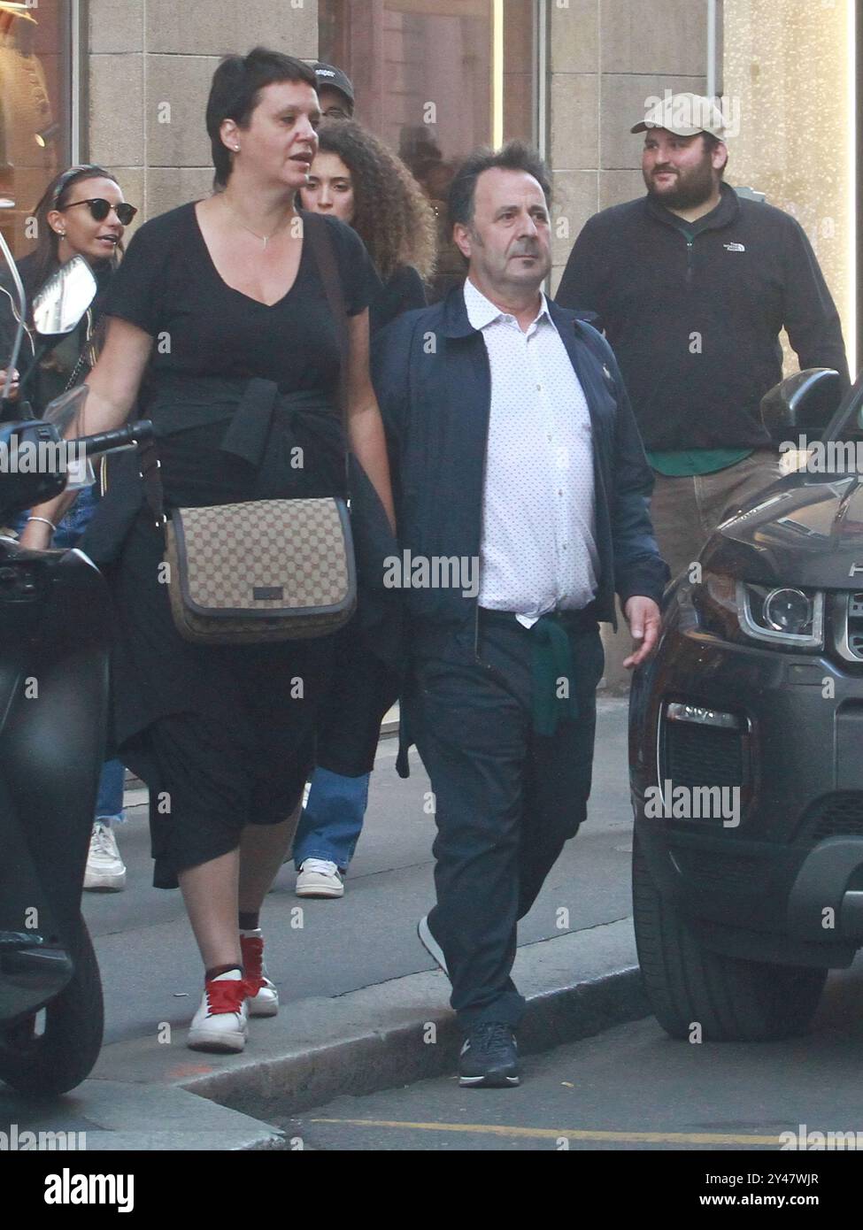09/16/2024 Milan Ph. Paolo Della Bella The Wizard Forest with his wife Angela walking hand in hand in via Monte Napoleone in Milan. The couple stops with fans for the ritual photos. Stock Photo