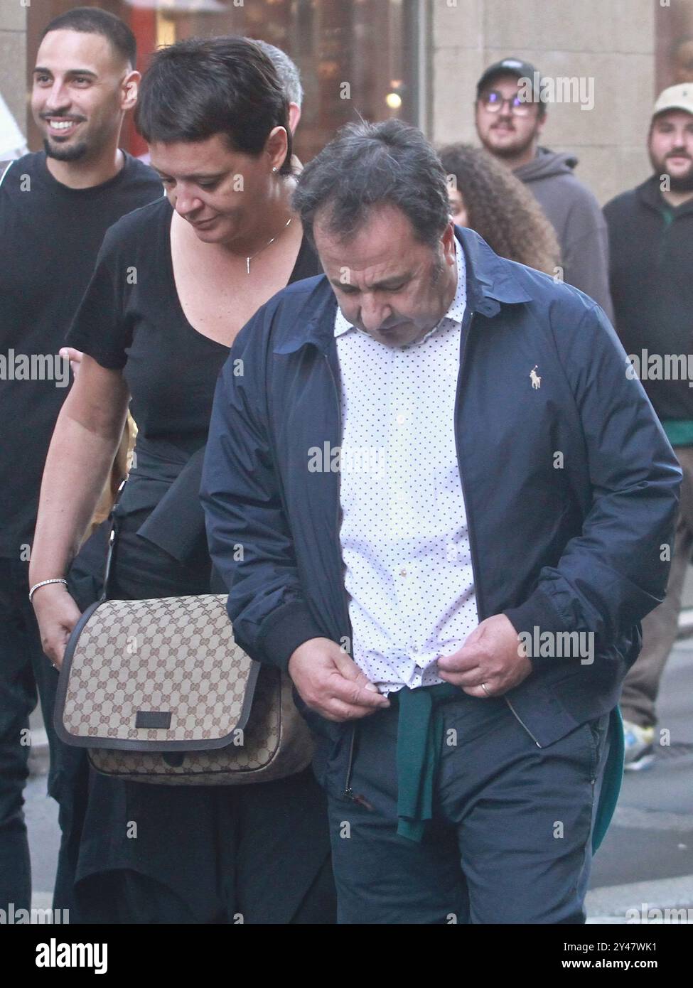09/16/2024 Milan Ph. Paolo Della Bella The Wizard Forest with his wife Angela walking hand in hand in via Monte Napoleone in Milan. The couple stops with fans for the ritual photos. Stock Photo