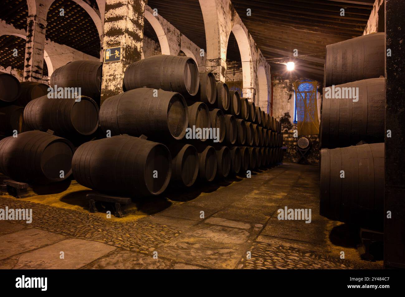 Solera System Solera system in old bodega, Andalusian wine cellar, process for aging ...
