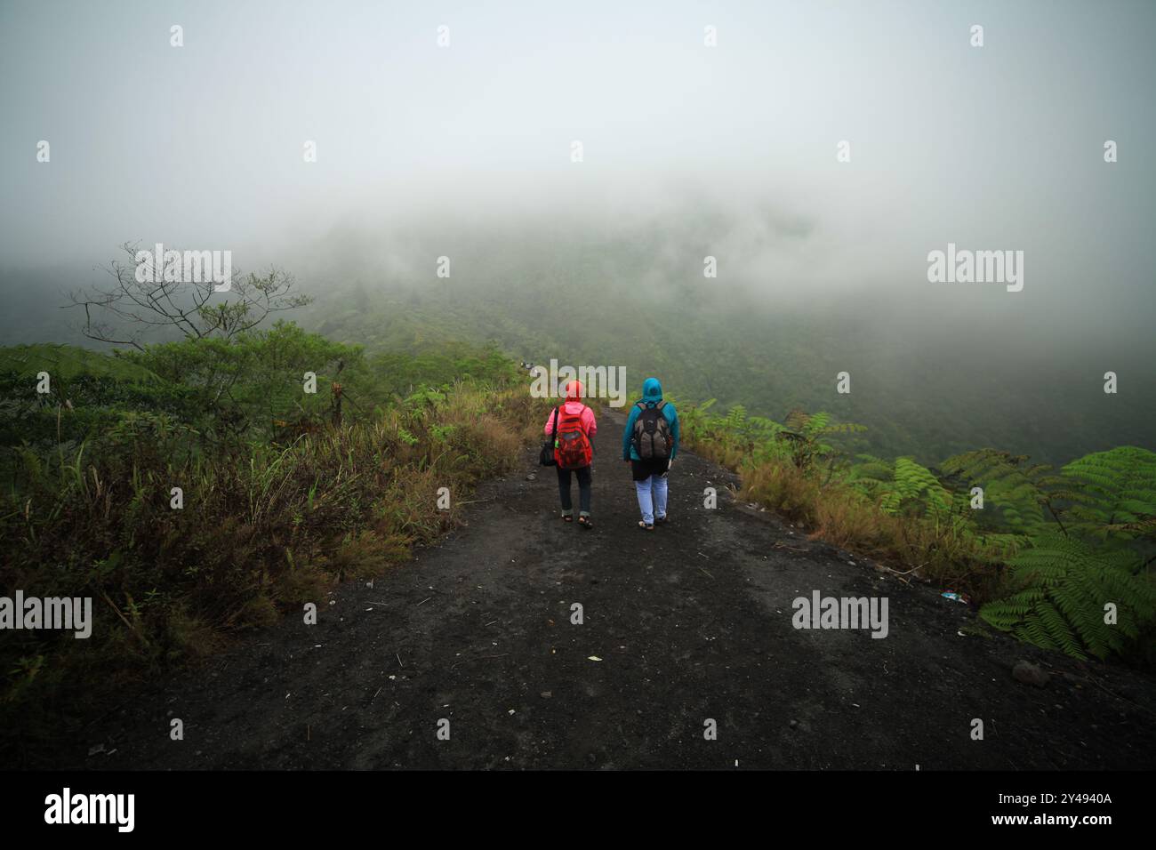people walking on galunggung mountain Stock Photo