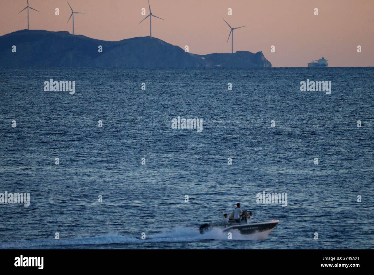 Windmill on uninhabited island  in  Greece Stock Photo