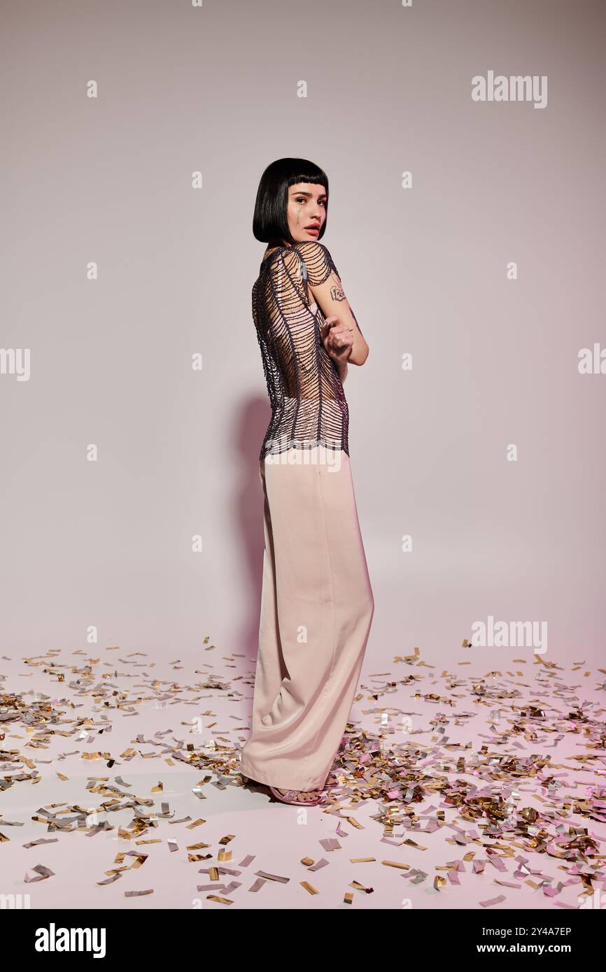 Attractive young woman striking hi-res stock photography and images - Alamy