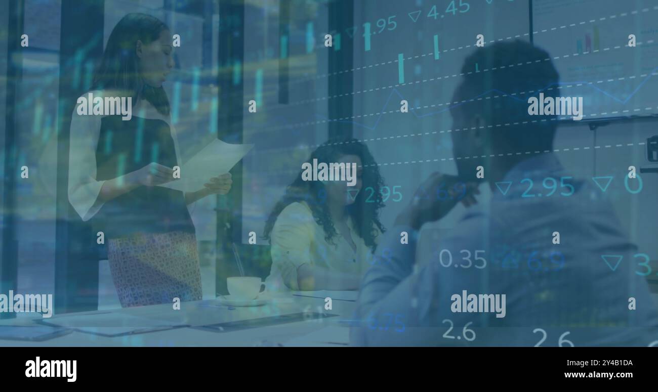 Image of financial data processing over diverse business people in office Stock Photo