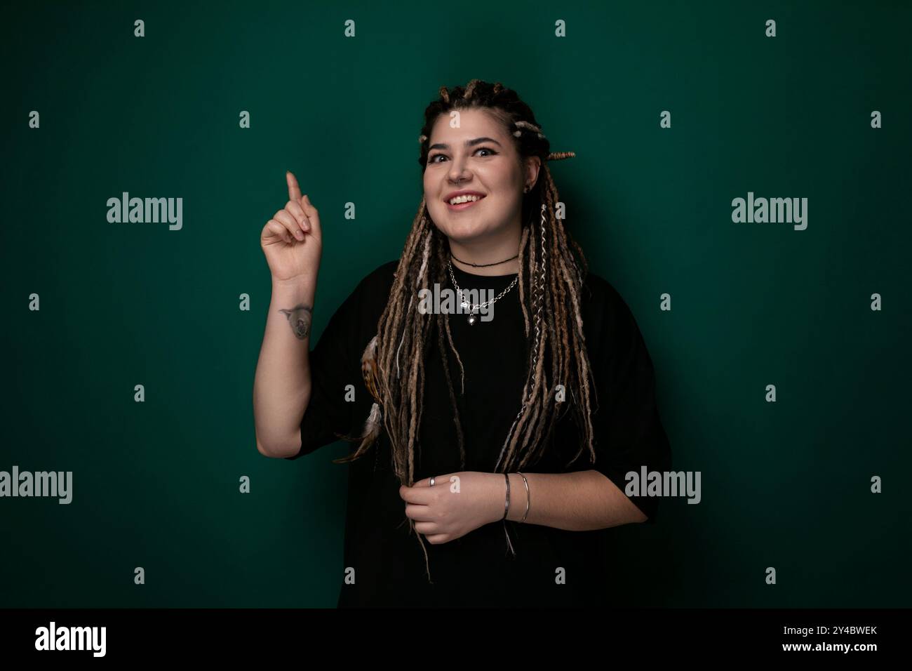Focused black woman dreadlocks hi-res stock photography and images - Alamy