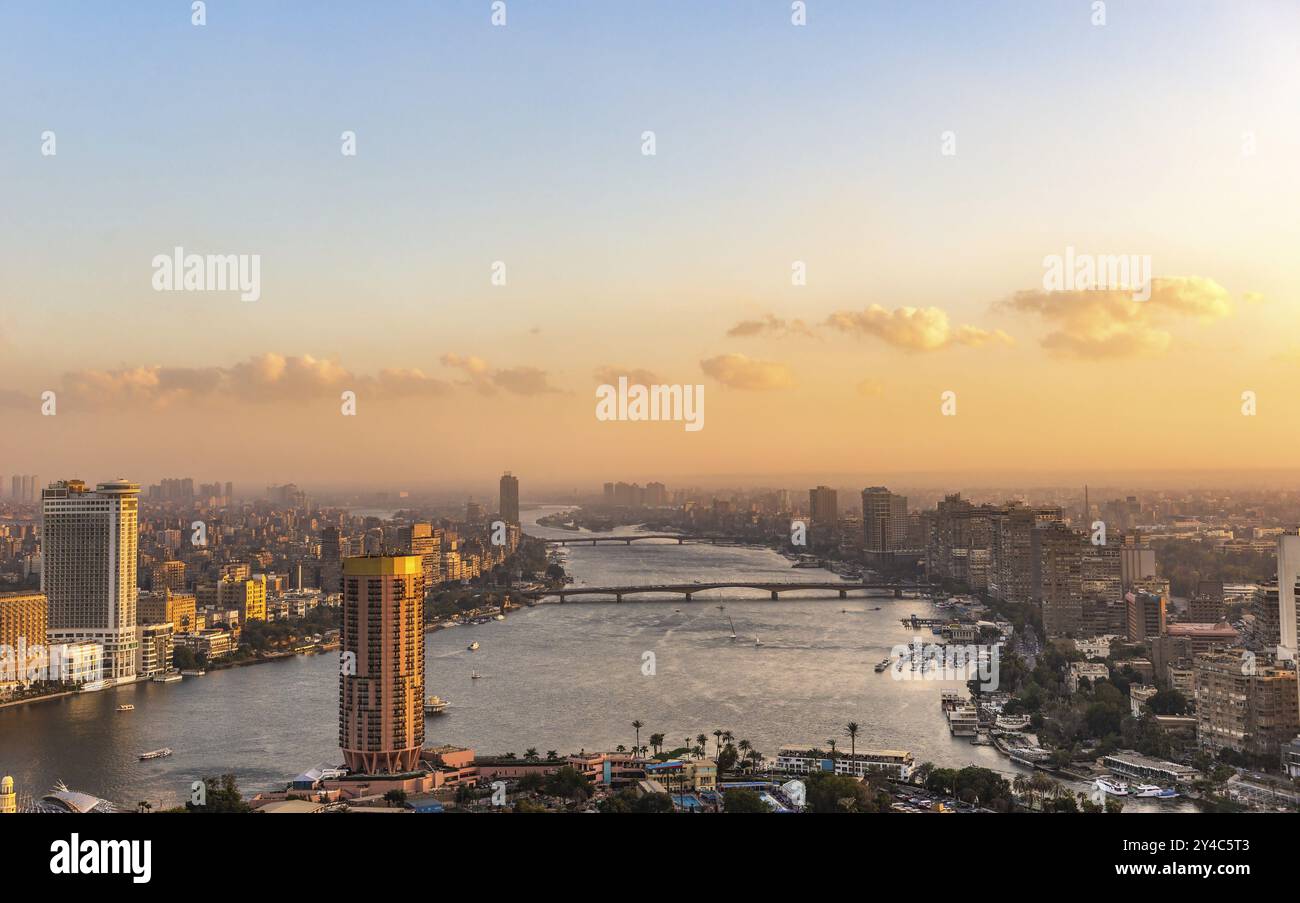 Skyscrapers on river Nile in Cairo at sunset, Egypt, Africa Stock Photo ...