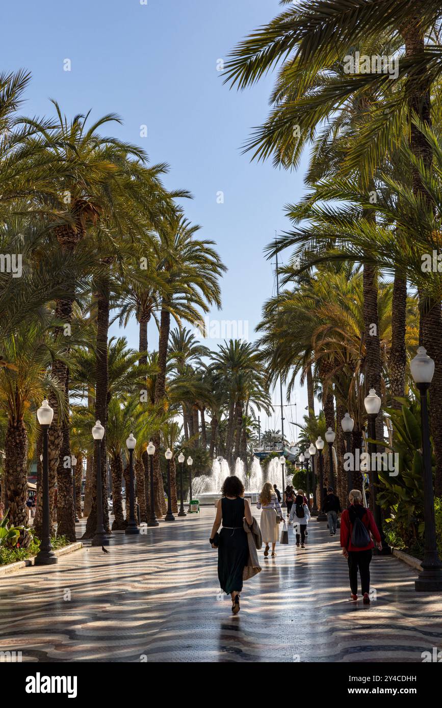 A woman walks down the promenade in Alicante, Spain Stock Photo - Alamy