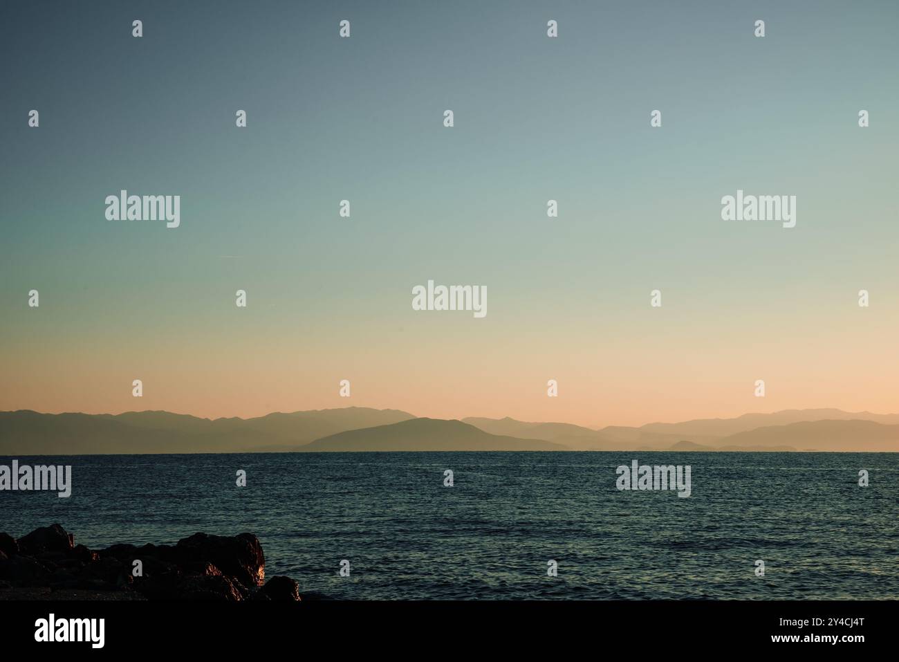 Blue sea calm day sunset hi-res stock photography and images - Alamy