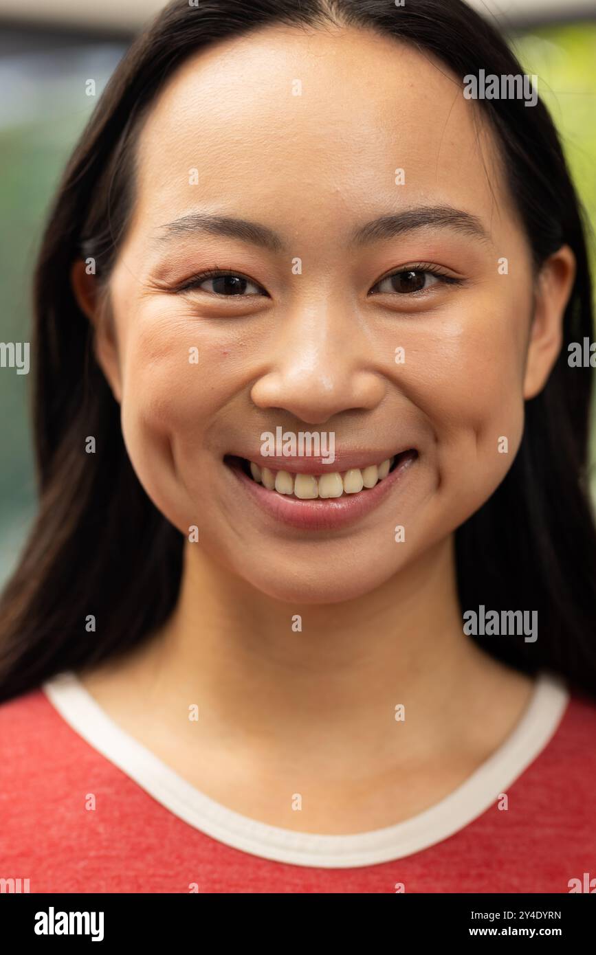 Asian woman looking camera in hi-res stock photography and images - Alamy