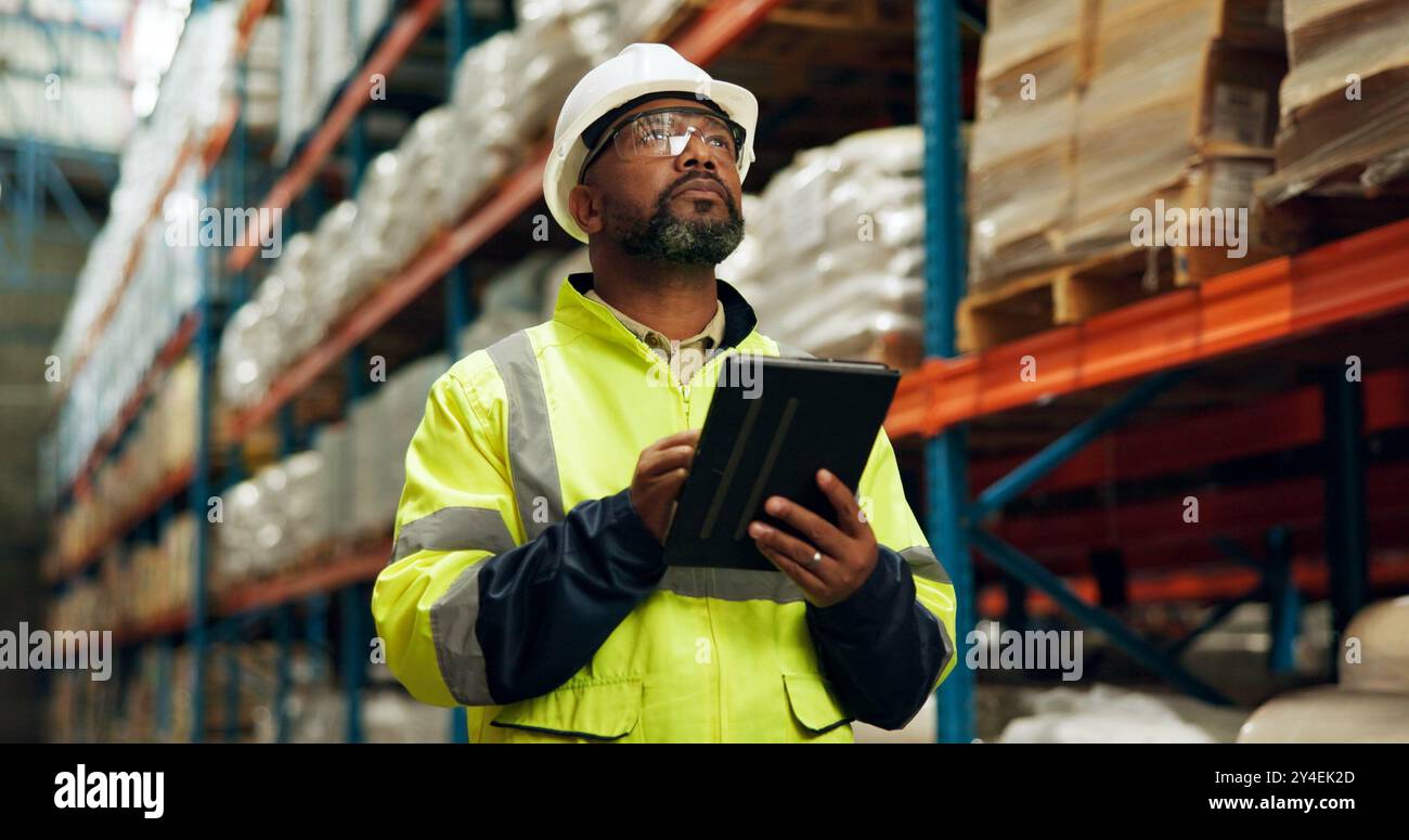 Black man, logistics and tablet at warehouse for distribution industry ...