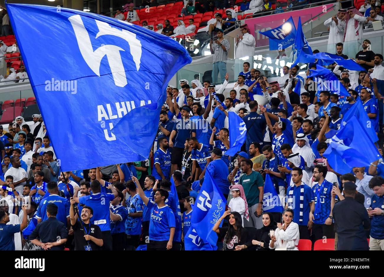 Al Rayyan, Qatar. 17th Sep, 2024. Fans of Al Hilal SFC cheer for their ...