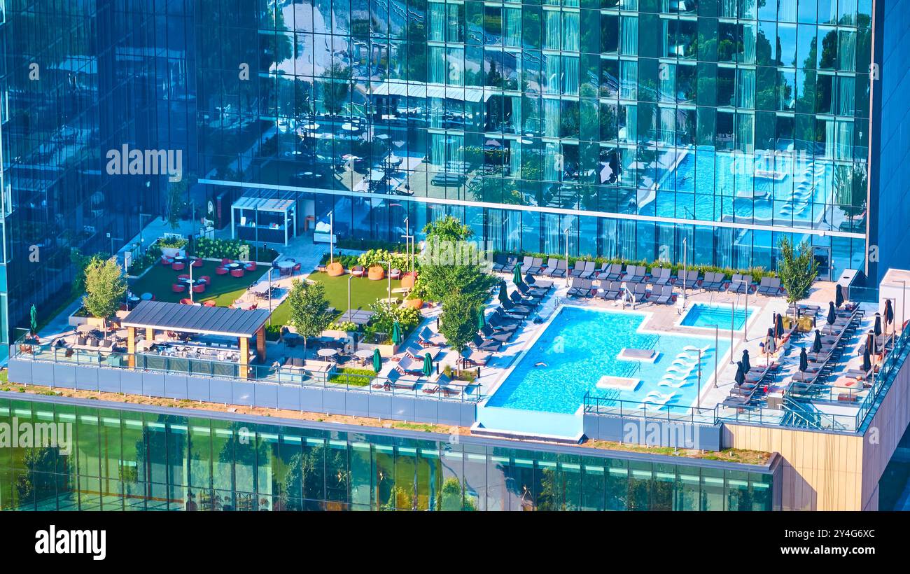Aerial Urban Oasis Rooftop Pool with Garden in Nashville at Golden Hour ...