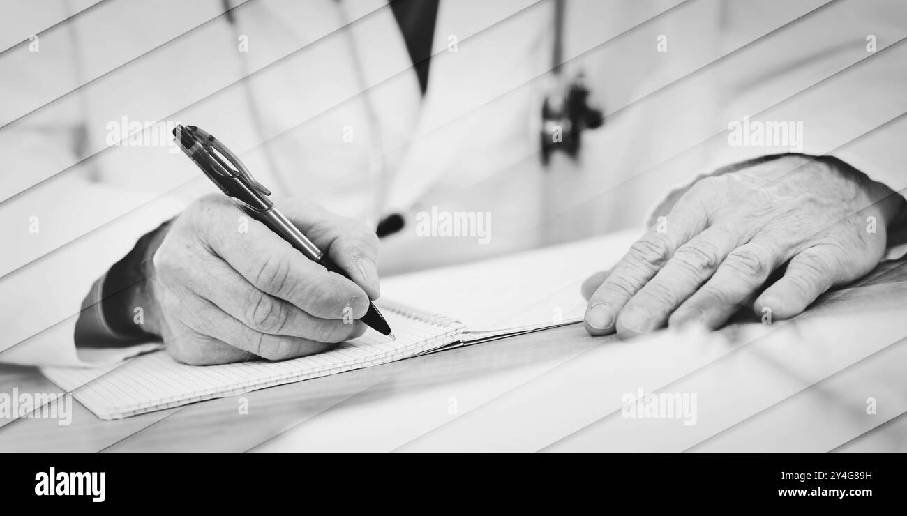 Doctor taking notes Black and White Stock Photos & Images - Alamy