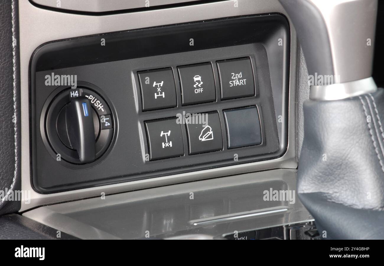 Panel with switches for off-road driving in an SUV Stock Photo - Alamy