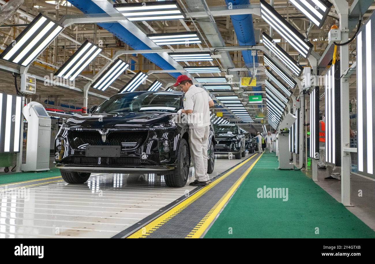 Wuhan, China's Hubei Province. 6th Sep, 2024. A worker checks the paint ...
