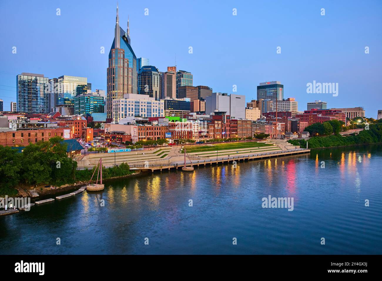Nashville Skyline at Dusk with Riverfront View Stock Photo - Alamy