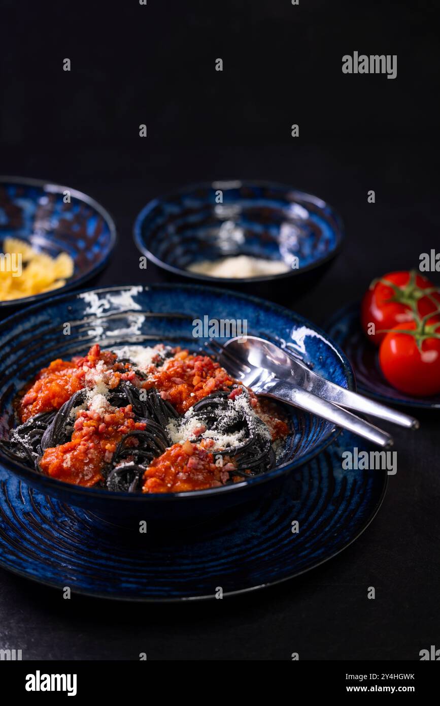 Italian still life with pasta and tomatoes Stock Photo