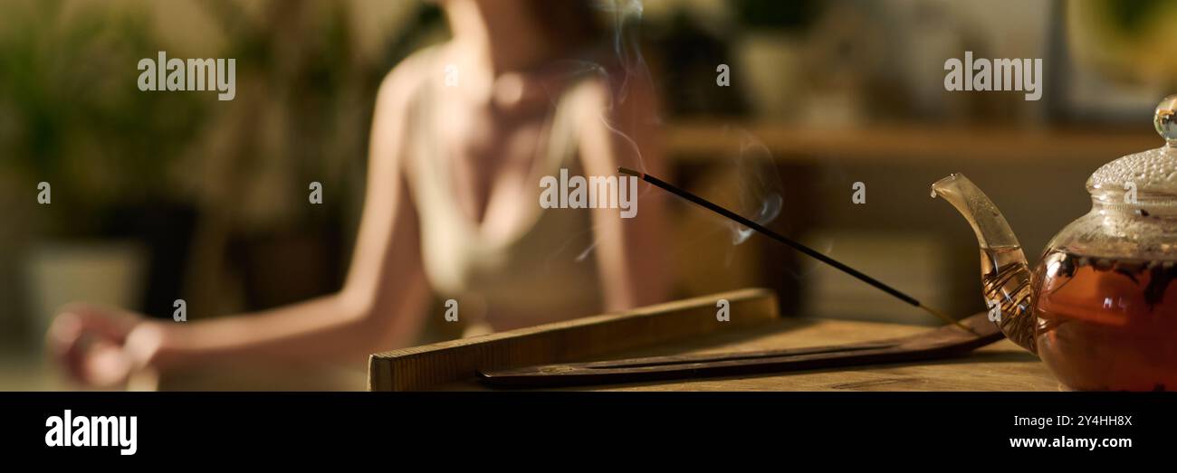 Tea Header header of part of wooden table with herbal tea in transparent teapot ...