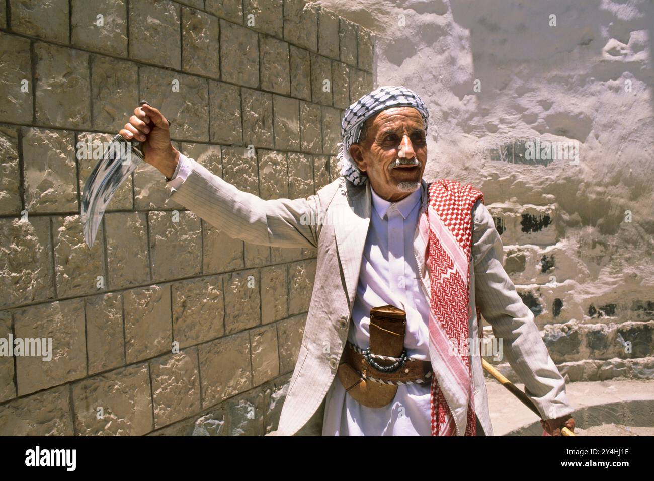 Asia. Yemen. Arabian Peninsula. An Elderly Yemeni Man Proudly Displays His Jambia Stock Photo