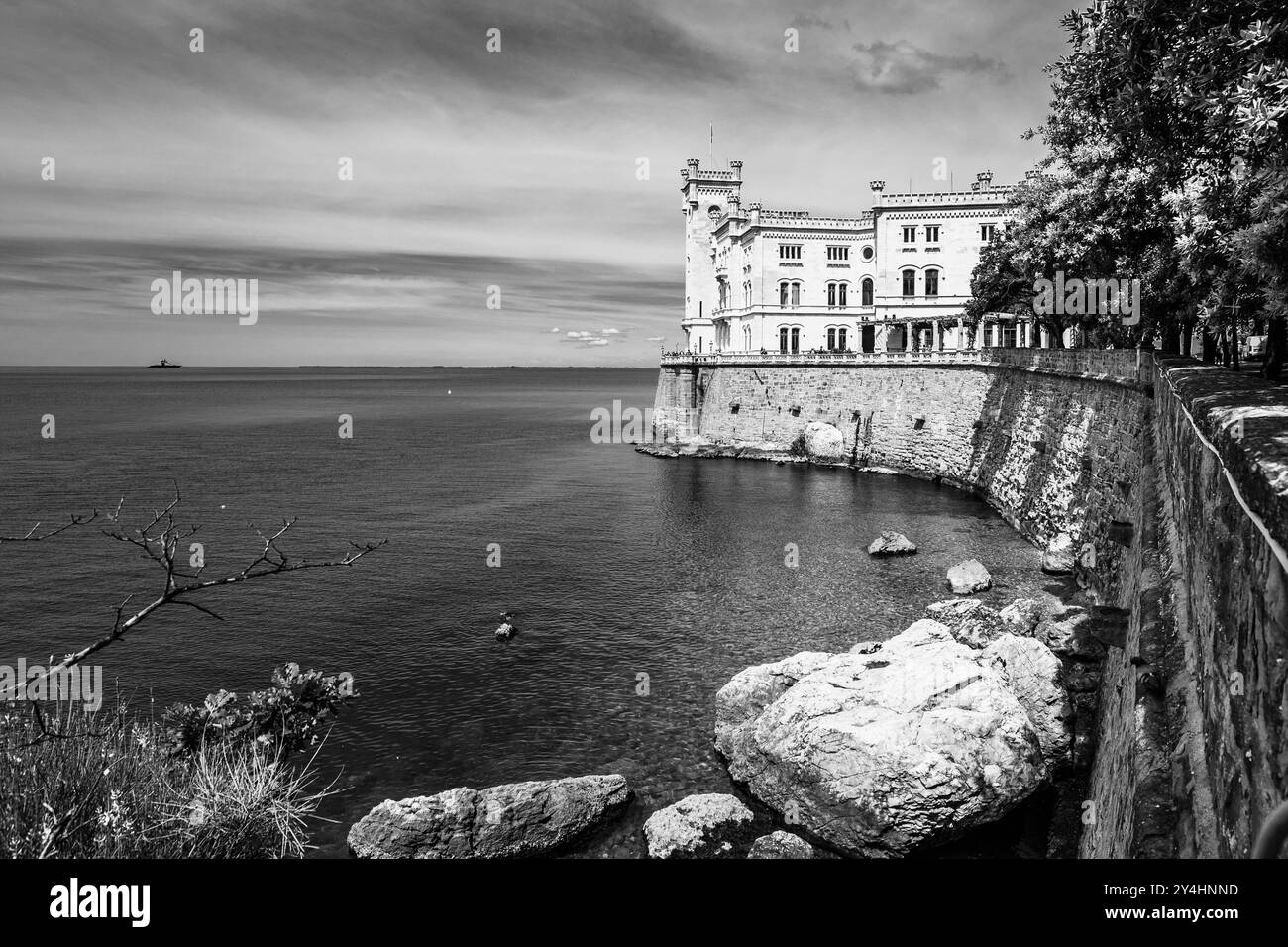 TRIESTE, ITALY – MAY 29, 2024: Miramare Castle. This historic castle, set on a cliff overlooking the Adriatic Sea, features elegant architecture and l Stock Photo