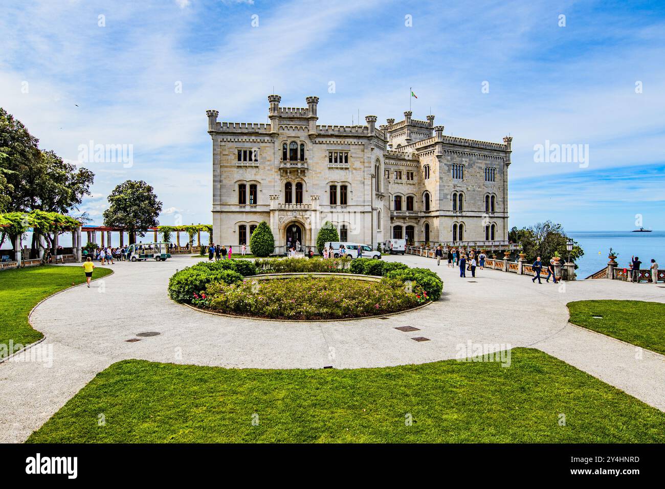 TRIESTE, ITALY – MAY 29, 2024: Miramare Castle. This historic castle, set on a cliff overlooking the Adriatic Sea, features elegant architecture and l Stock Photo