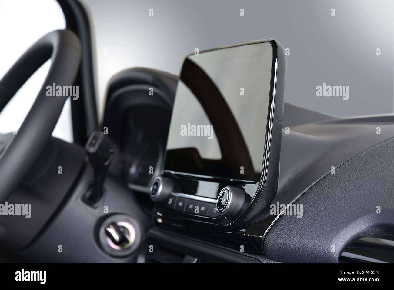 Screen multimedia system on dashboard in a modern car Stock Photo