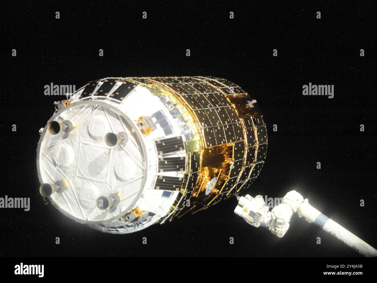 International Space Station, Earth Orbit. 17 September, 2009. The Canadarm2 robotic arm grapples the unmanned Japanese H-II Transfer Vehicle as it approaches to dock at the International Space Station, September 17, 2009 in Earth Orbit.   Credit: JAXA/NASA/Alamy Live News Stock Photo