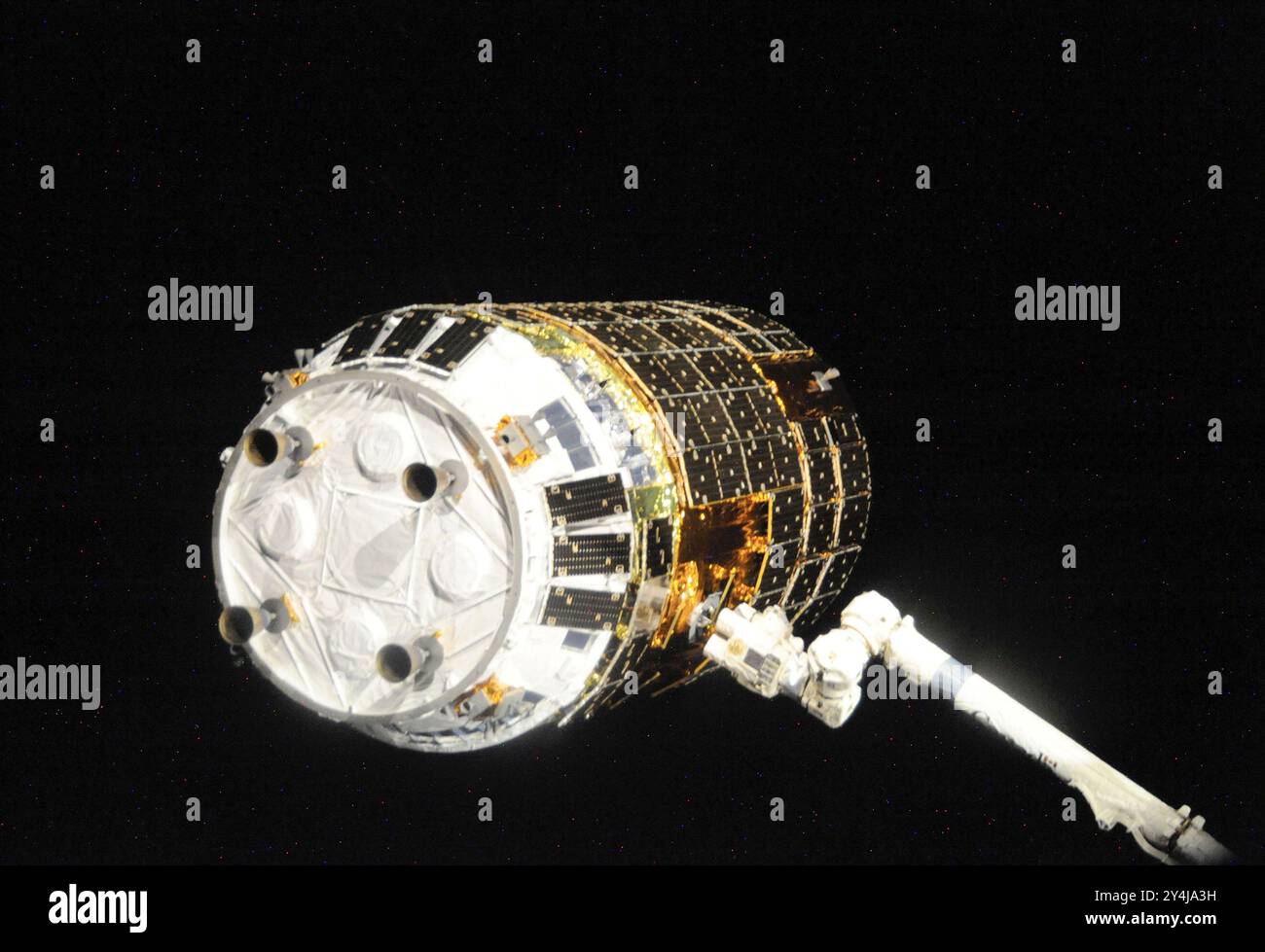 International Space Station, Earth Orbit. 17 September, 2009. The Canadarm2 robotic arm grapples the unmanned Japanese H-II Transfer Vehicle as it approaches to dock at the International Space Station, September 17, 2009 in Earth Orbit.   Credit: JAXA/NASA/Alamy Live News Stock Photo