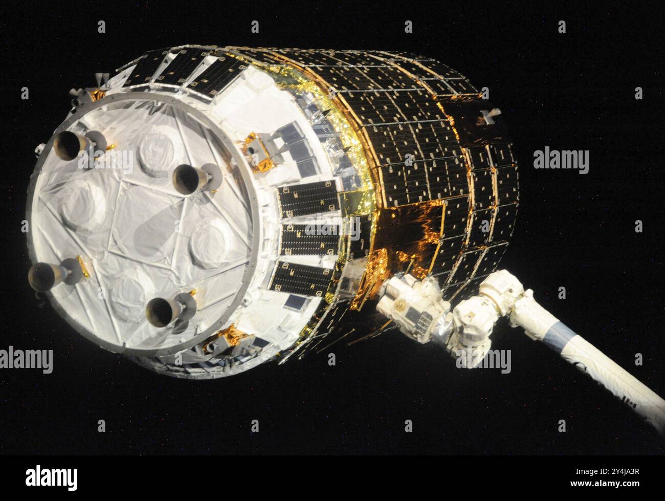 International Space Station, Earth Orbit. 17 September, 2009. The Canadarm2 robotic arm grapples the unmanned Japanese H-II Transfer Vehicle as it approaches to dock at the International Space Station, September 17, 2009 in Earth Orbit.   Credit: JAXA/NASA/Alamy Live News Stock Photo