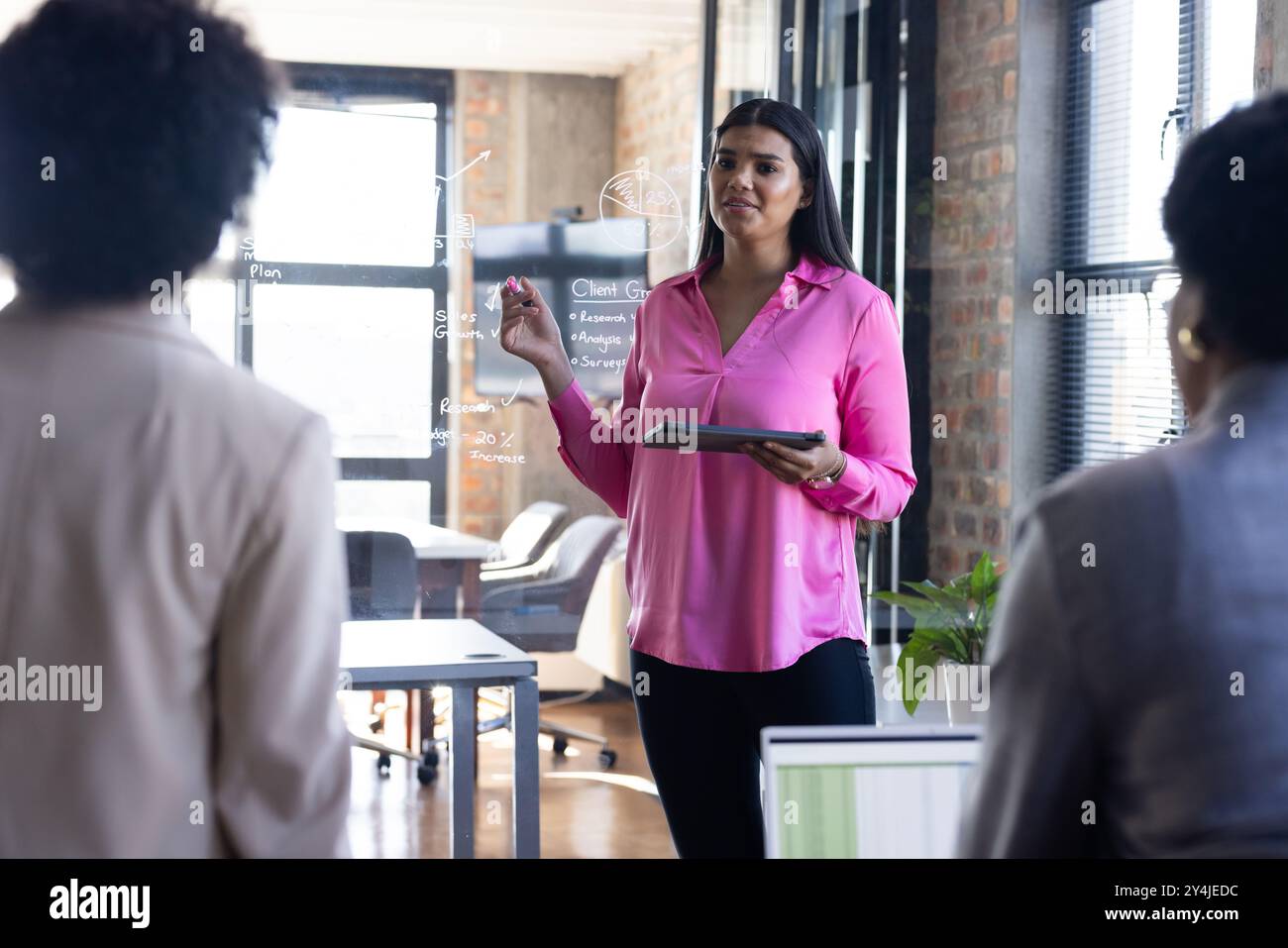 Woman colleagues on corporate hi-res stock photography and images - Alamy