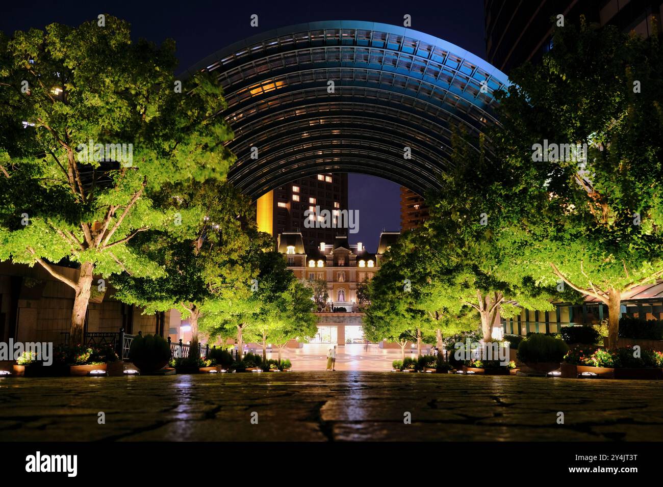 The night view of glass arch covered Yebisu Garden Place the former home of the Yebisu Beer Brewery, nowadays is a shopping and culture complex in Ebisu.Tokyo.Japan Stock Photo