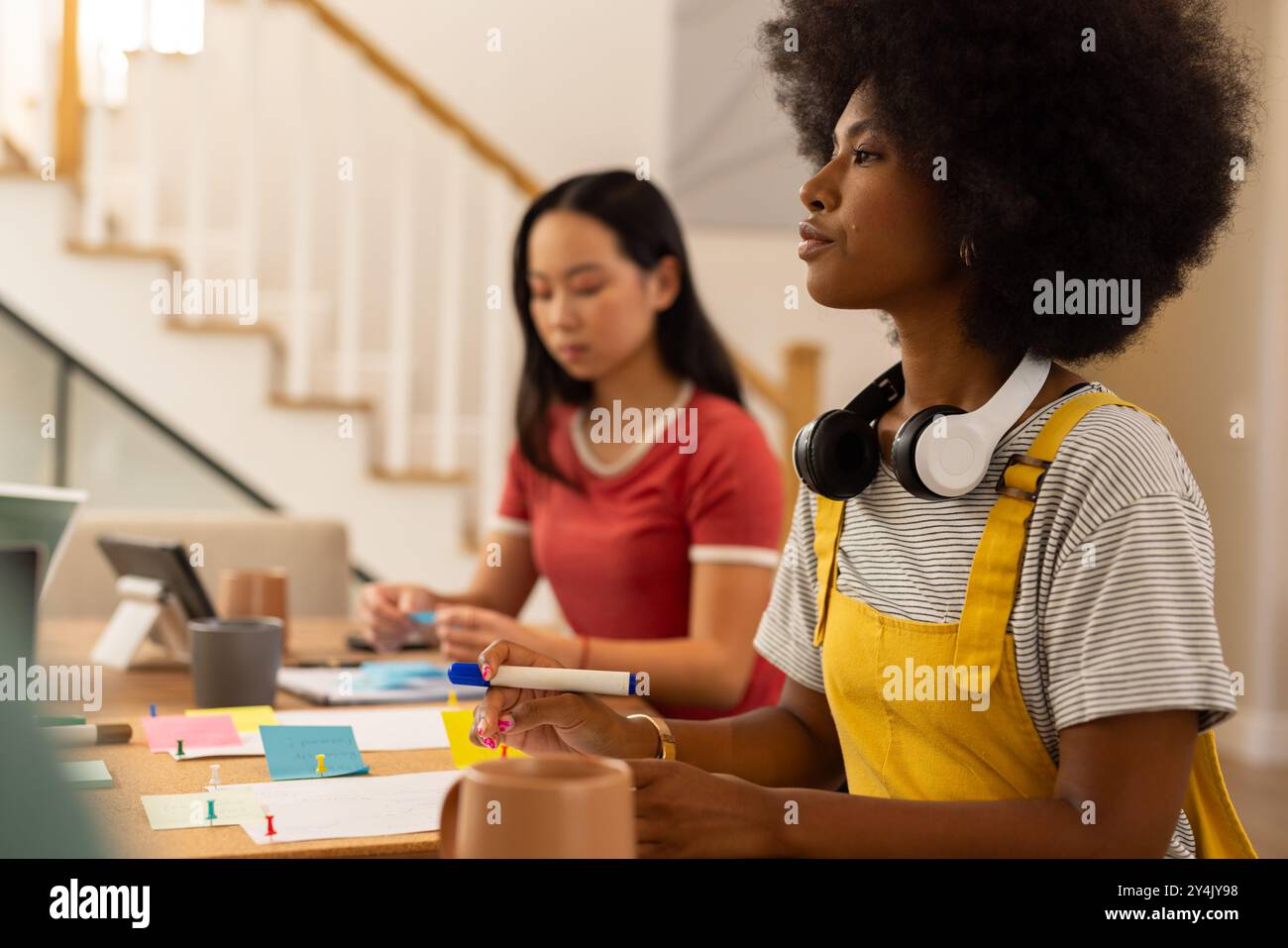 Start up business, Studying together, two young women working on school project at table Stock Photo