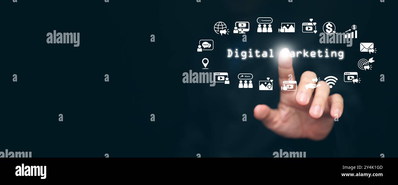 Digital marketing concept. Hand taps on the text, digital marketing, surrounded with online marketing icons through social media, email, website and o Stock Photo