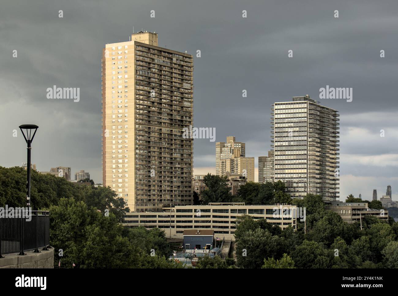 Picture of Descending telephoto drone view of high-rise apartment buildings in ...