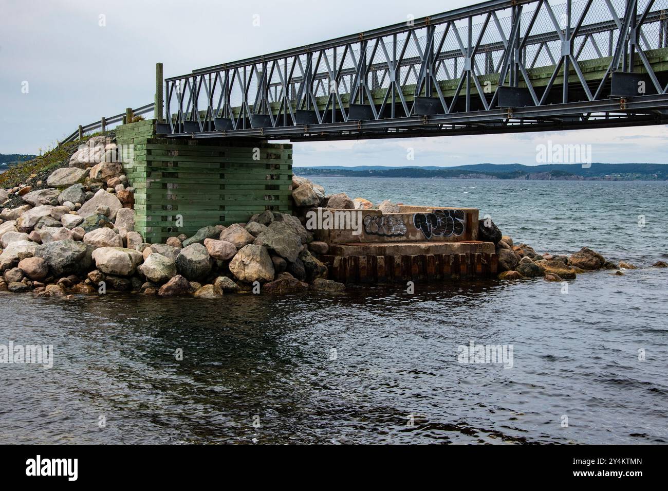 Pedestrian bridge, formerly a rail bridge, in Seal Cove, Conception Bay South, Newfoundland & Labrador, Canada Stock Photo