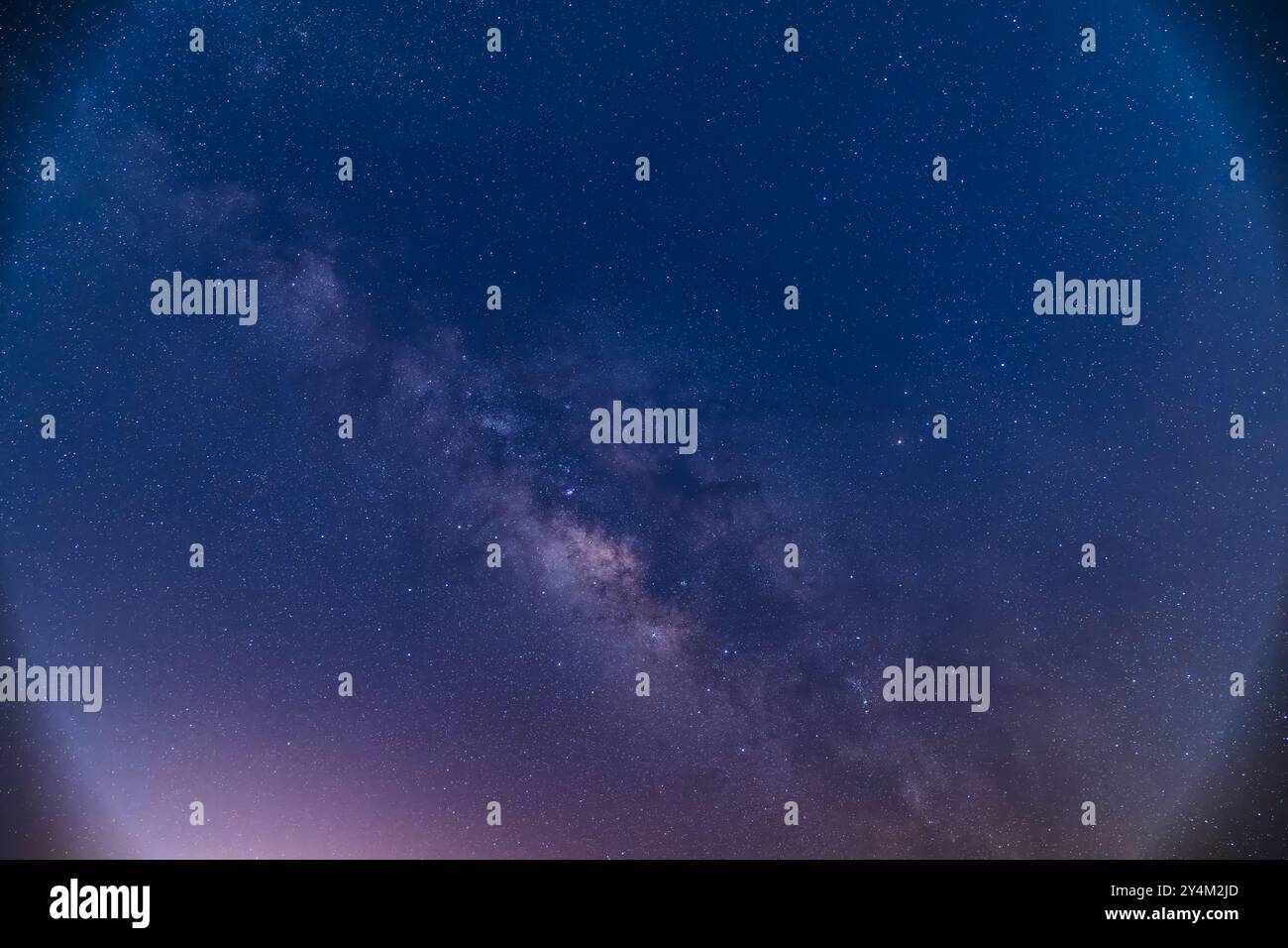 A breathtaking view of the Milky Way stretching across the night sky ...