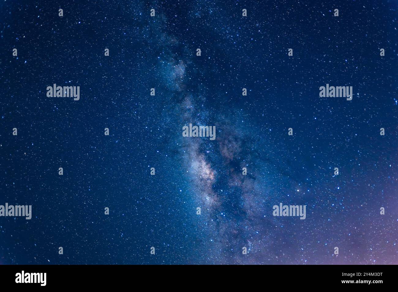 A breathtaking view of the Milky Way stretching across the night sky ...