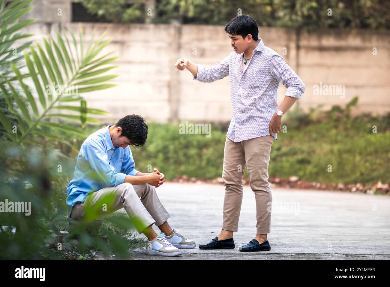 An employee being scolded by his boss. A man scolding and yelling at ...