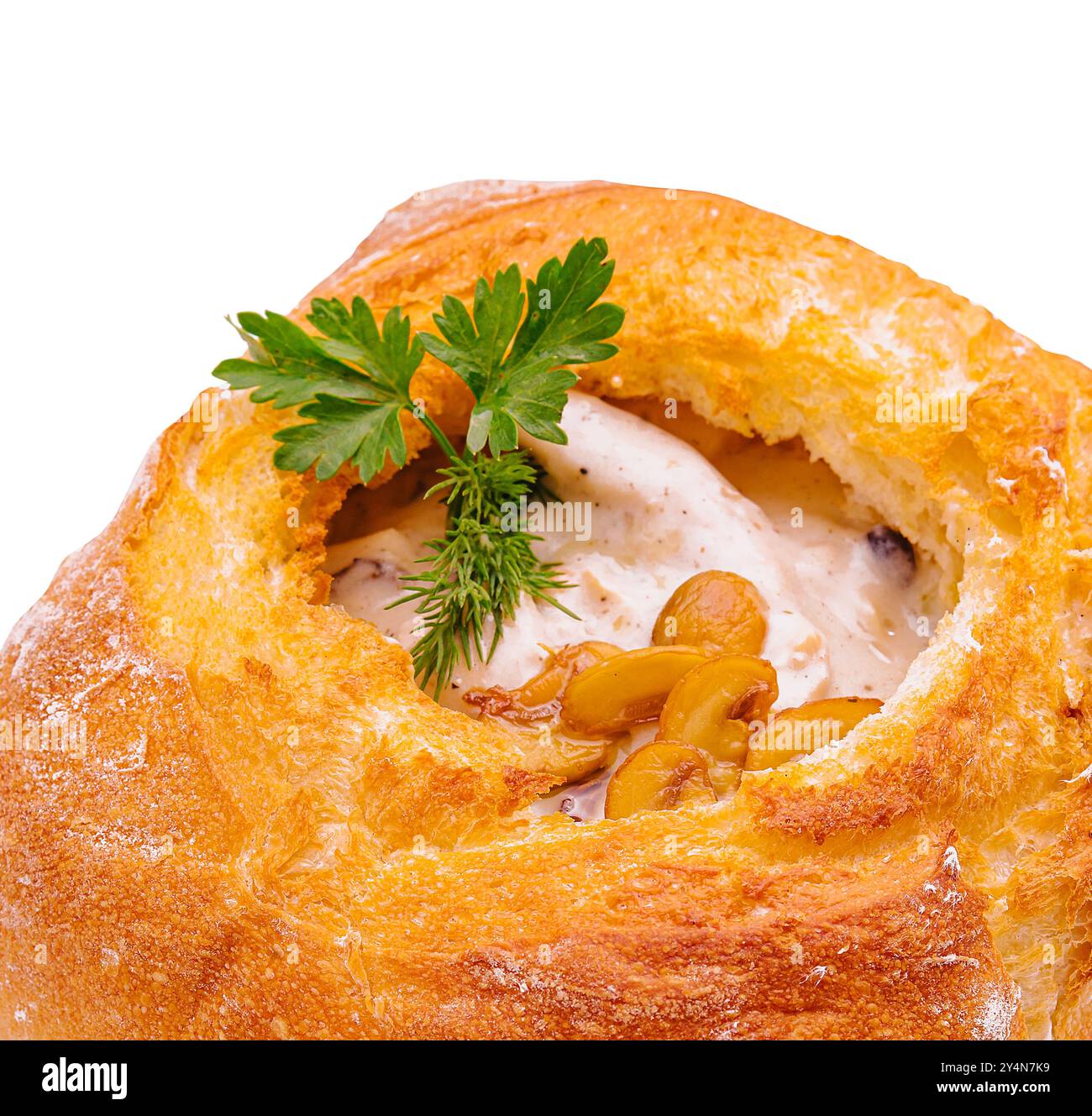 cream soup in bread isolated on white Stock Photo