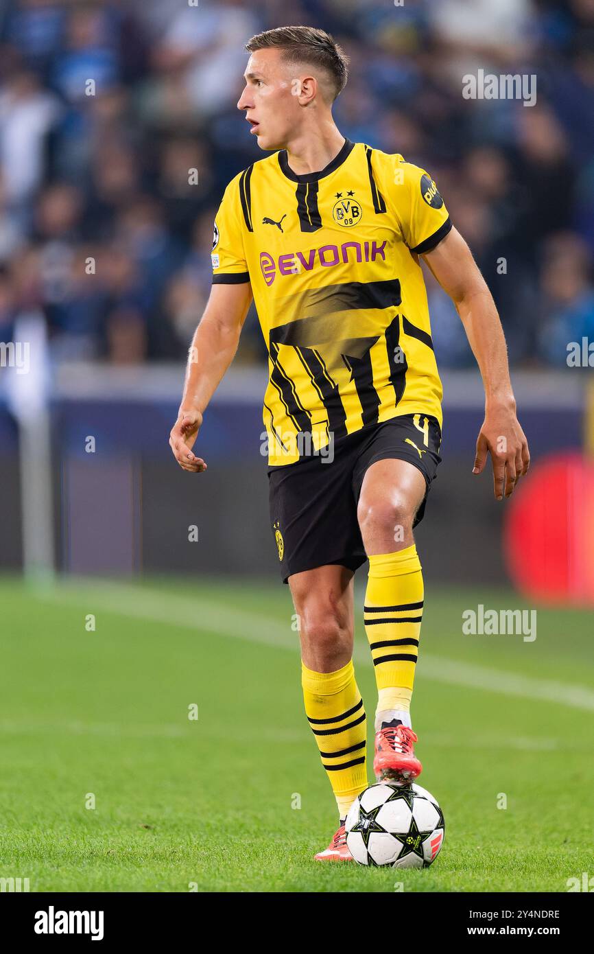 Bruges, Belgium. 18th Sep, 2024. BRUGES, BELGIUM - SEPTEMBER 18: Nico Schlotterbeck of Borussia Dortmund in action during the UEFA Champions League 2024/25 League Phase MD1 match between Club Brugge KV and Borussia Dortmund at Jan Breydelstadion on September 18, 2024 in Bruges, Belgium. (Photo by Joris Verwijst/BSR Agency) Credit: BSR Agency/Alamy Live News Stock Photo