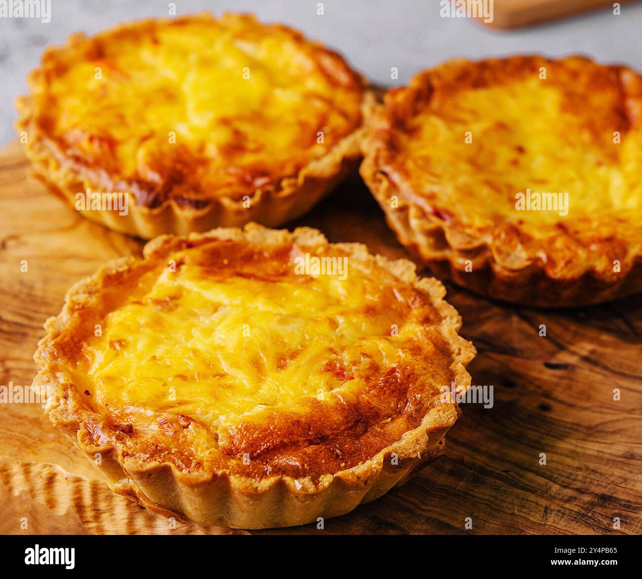 Mini quiche lorraine with cheddar cheese Stock Photo - Alamy